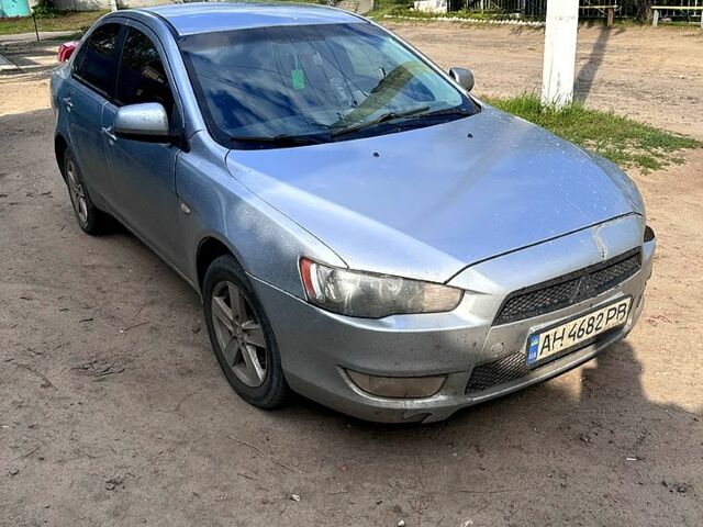 Серый Мицубиси Лансер, объемом двигателя 1.5 л и пробегом 300 тыс. км за 4200 $, фото 1 на Automoto.ua