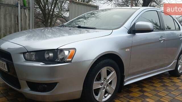 Серый Мицубиси Лансер, объемом двигателя 2 л и пробегом 149 тыс. км за 6800 $, фото 1 на Automoto.ua