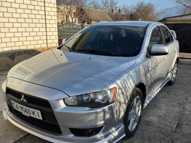 Серый Мицубиси Лансер, объемом двигателя 2 л и пробегом 246 тыс. км за 6500 $, фото 1 на Automoto.ua