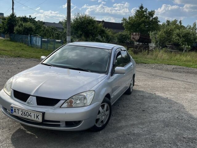 Сірий Міцубісі Lancer, об'ємом двигуна 1.6 л та пробігом 270 тис. км за 2500 $, фото 1 на Automoto.ua