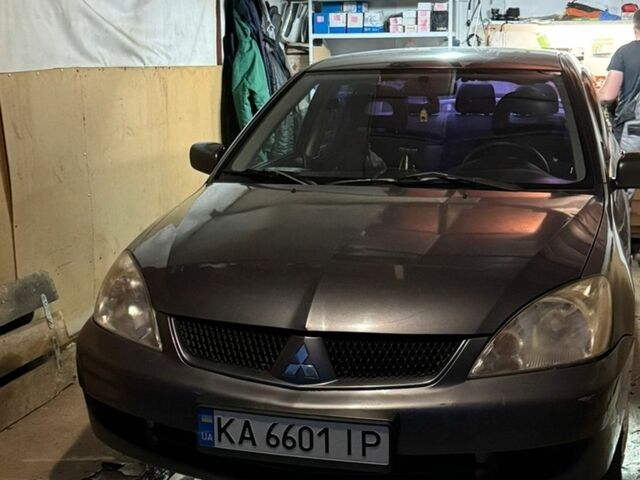 Сірий Міцубісі Lancer, об'ємом двигуна 1.58 л та пробігом 290 тис. км за 3100 $, фото 1 на Automoto.ua