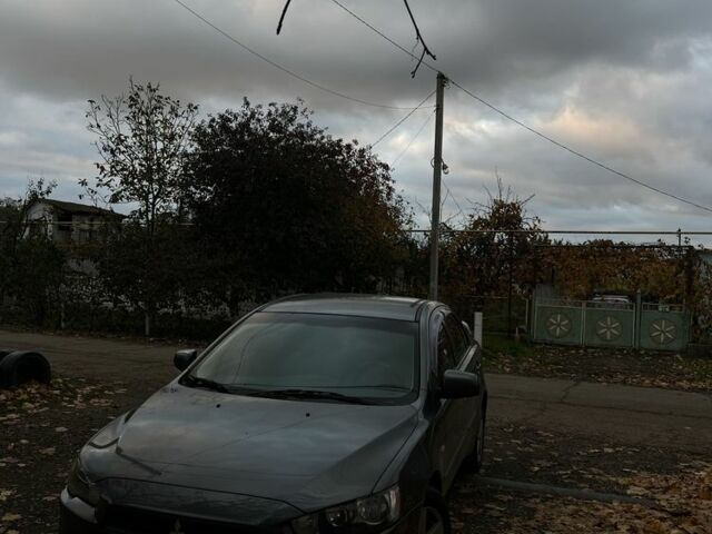 Сірий Міцубісі Lancer, об'ємом двигуна 2 л та пробігом 250 тис. км за 5555 $, фото 1 на Automoto.ua
