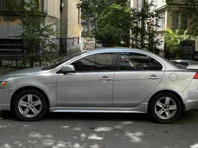 Сірий Міцубісі Lancer, об'ємом двигуна 2 л та пробігом 100 тис. км за 7131 $, фото 1 на Automoto.ua