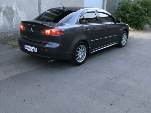 Сірий Міцубісі Lancer, об'ємом двигуна 2 л та пробігом 230 тис. км за 7300 $, фото 1 на Automoto.ua