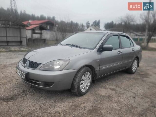 Сірий Міцубісі Lancer, об'ємом двигуна 1.6 л та пробігом 440 тис. км за 4200 $, фото 1 на Automoto.ua