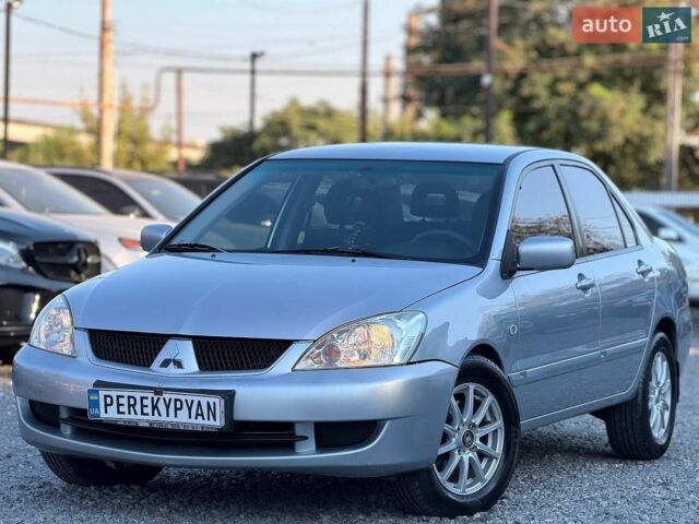 Сірий Міцубісі Lancer, об'ємом двигуна 1.6 л та пробігом 187 тис. км за 4950 $, фото 1 на Automoto.ua
