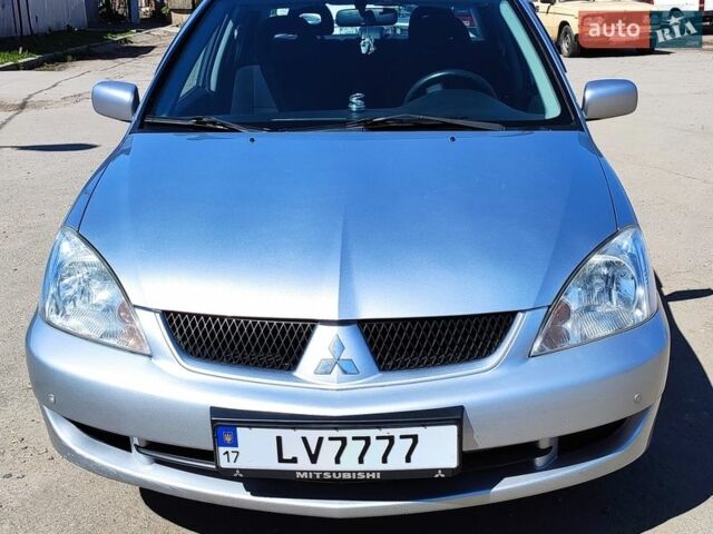 Сірий Міцубісі Lancer, об'ємом двигуна 1.58 л та пробігом 158 тис. км за 4900 $, фото 1 на Automoto.ua