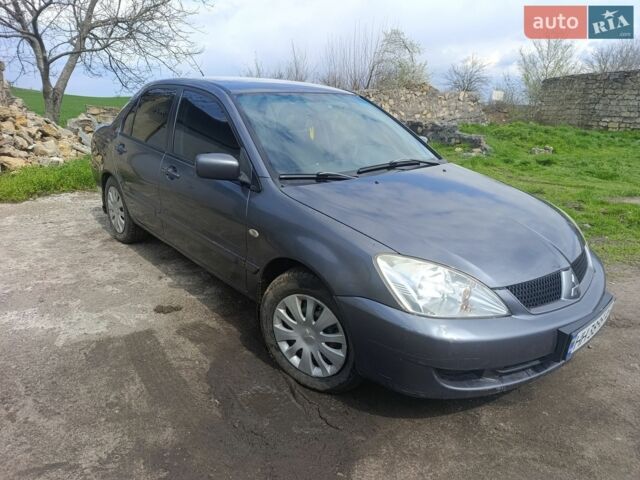 Сірий Міцубісі Lancer, об'ємом двигуна 1.6 л та пробігом 430 тис. км за 3000 $, фото 1 на Automoto.ua
