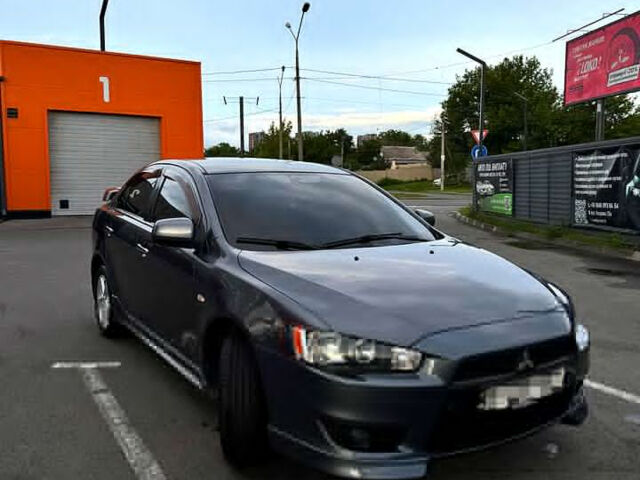 Сірий Міцубісі Lancer, об'ємом двигуна 2 л та пробігом 180 тис. км за 7600 $, фото 1 на Automoto.ua