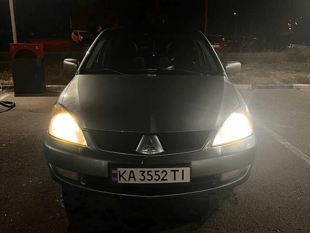 Сірий Міцубісі Lancer, об'ємом двигуна 1.58 л та пробігом 290 тис. км за 2199 $, фото 1 на Automoto.ua
