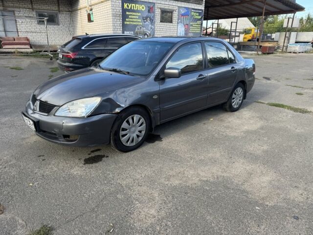 Сірий Міцубісі Lancer, об'ємом двигуна 1.6 л та пробігом 450 тис. км за 2200 $, фото 1 на Automoto.ua