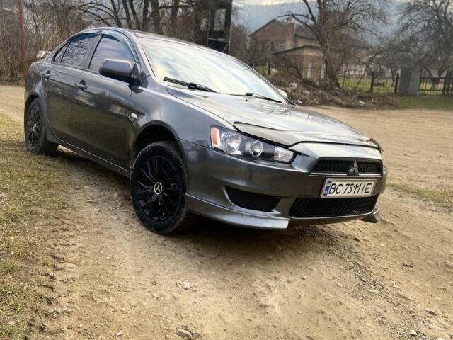 Сірий Міцубісі Lancer, об'ємом двигуна 2 л та пробігом 220 тис. км за 5750 $, фото 1 на Automoto.ua