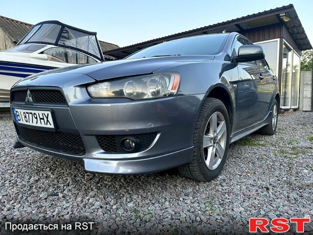 Сірий Міцубісі Lancer, об'ємом двигуна 2 л та пробігом 208 тис. км за 5899 $, фото 1 на Automoto.ua