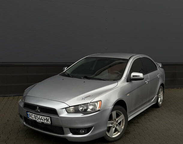 Серый Мицубиси Лансер, объемом двигателя 2 л и пробегом 240 тыс. км за 5100 $, фото 1 на Automoto.ua