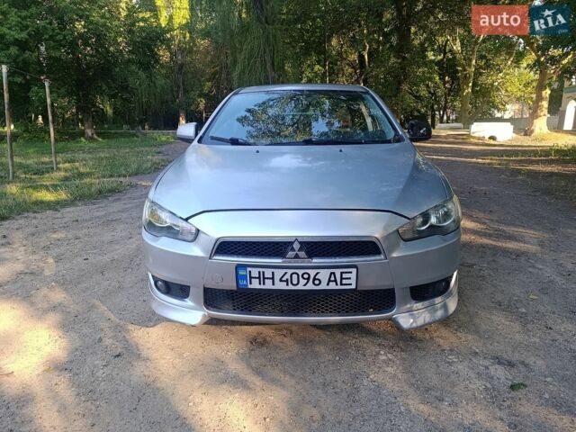 Серый Мицубиси Лансер, объемом двигателя 2 л и пробегом 268 тыс. км за 4300 $, фото 1 на Automoto.ua