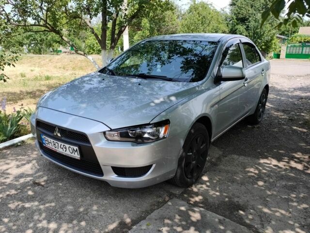 Сірий Міцубісі Lancer, об'ємом двигуна 1 л та пробігом 2 тис. км за 6900 $, фото 1 на Automoto.ua