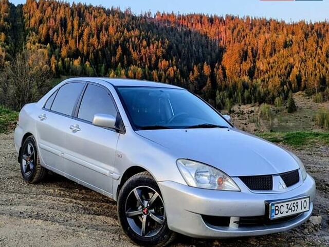 Сірий Міцубісі Lancer, об'ємом двигуна 1.6 л та пробігом 260 тис. км за 4200 $, фото 1 на Automoto.ua