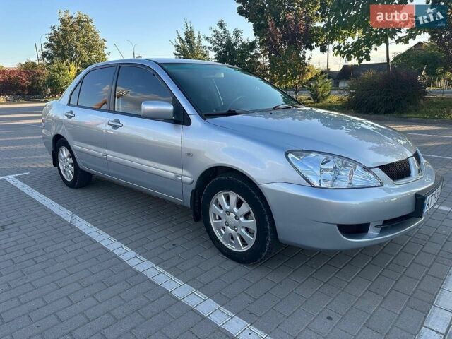 Сірий Міцубісі Lancer, об'ємом двигуна 1.6 л та пробігом 153 тис. км за 3999 $, фото 1 на Automoto.ua