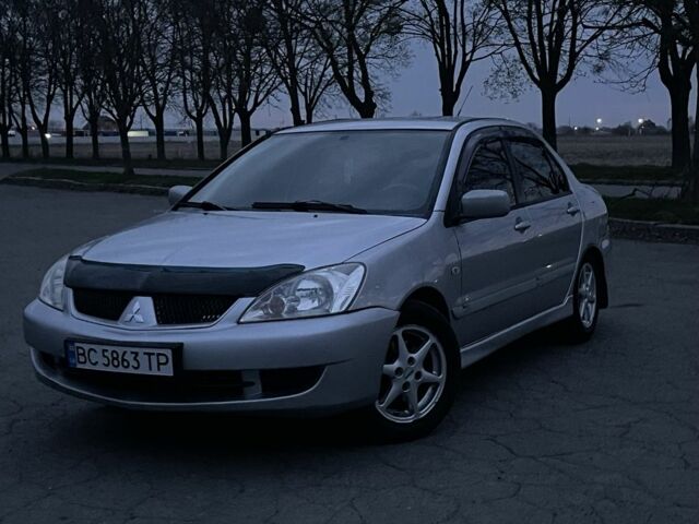 Серый Мицубиси Лансер, объемом двигателя 1.6 л и пробегом 272 тыс. км за 3000 $, фото 1 на Automoto.ua