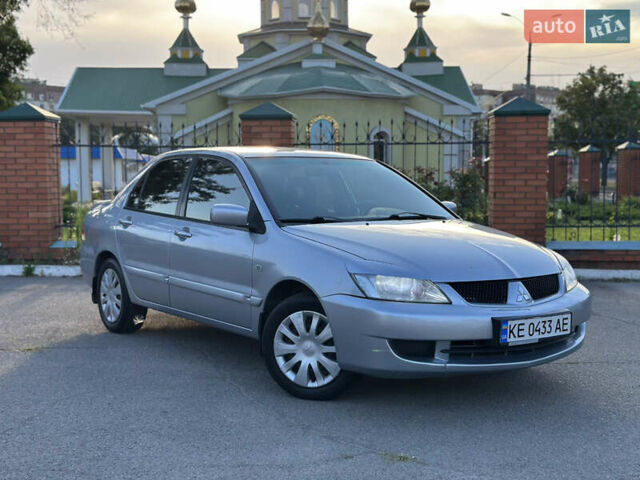 Сірий Міцубісі Lancer, об'ємом двигуна 1.6 л та пробігом 278 тис. км за 3999 $, фото 1 на Automoto.ua