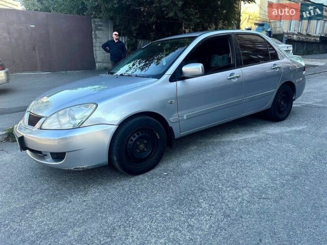 Сірий Міцубісі Lancer, об'ємом двигуна 1.6 л та пробігом 198 тис. км за 3200 $, фото 1 на Automoto.ua