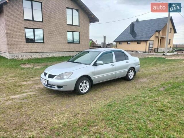 Сірий Міцубісі Lancer, об'ємом двигуна 1.6 л та пробігом 174 тис. км за 4100 $, фото 1 на Automoto.ua