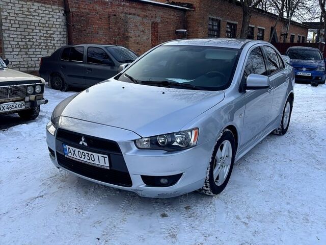 Серый Мицубиси Лансер, объемом двигателя 2 л и пробегом 20400 тыс. км за 5950 $, фото 1 на Automoto.ua