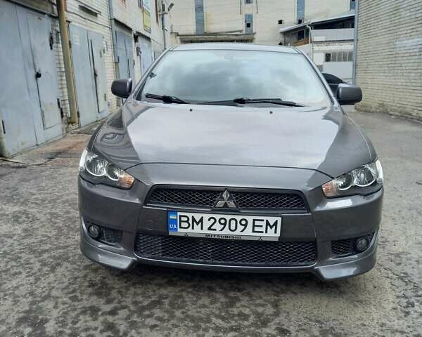 Серый Мицубиси Лансер, объемом двигателя 2 л и пробегом 99 тыс. км за 7800 $, фото 1 на Automoto.ua