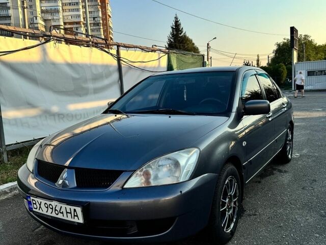 Сірий Міцубісі Lancer, об'ємом двигуна 1.58 л та пробігом 204 тис. км за 4800 $, фото 1 на Automoto.ua