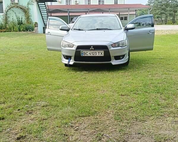 Серый Мицубиси Лансер, объемом двигателя 2 л и пробегом 250 тыс. км за 5400 $, фото 1 на Automoto.ua
