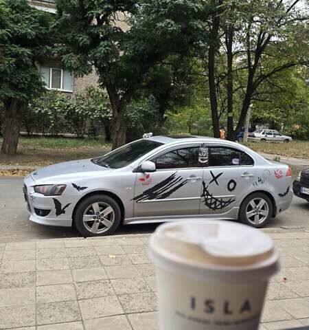 Серый Мицубиси Лансер, объемом двигателя 1.5 л и пробегом 360 тыс. км за 6500 $, фото 1 на Automoto.ua