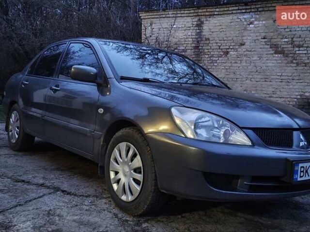 Сірий Міцубісі Lancer, об'ємом двигуна 1.6 л та пробігом 230 тис. км за 4400 $, фото 1 на Automoto.ua