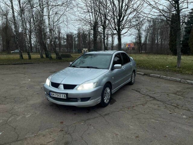 Сірий Міцубісі Lancer, об'ємом двигуна 1.6 л та пробігом 254 тис. км за 3800 $, фото 1 на Automoto.ua
