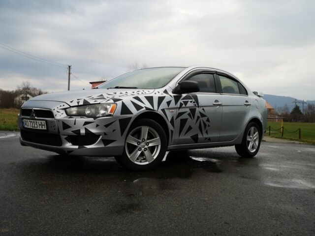 Серый Мицубиси Лансер, объемом двигателя 2 л и пробегом 260 тыс. км за 5200 $, фото 1 на Automoto.ua