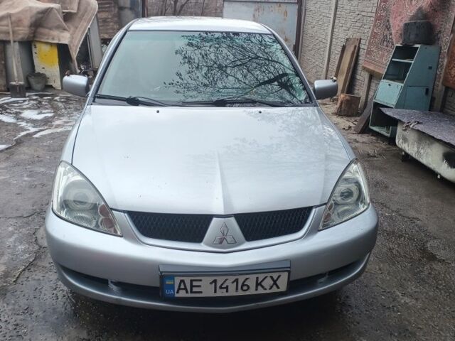 Сірий Міцубісі Lancer, об'ємом двигуна 1.6 л та пробігом 320 тис. км за 4167 $, фото 1 на Automoto.ua