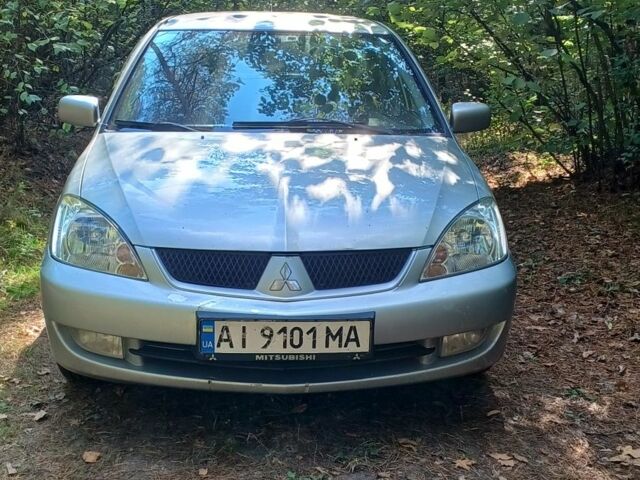 Сірий Міцубісі Lancer, об'ємом двигуна 1.6 л та пробігом 230 тис. км за 3910 $, фото 1 на Automoto.ua