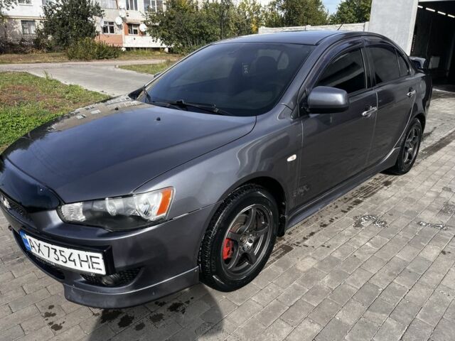 Серый Мицубиси Лансер, объемом двигателя 2 л и пробегом 224 тыс. км за 6500 $, фото 1 на Automoto.ua