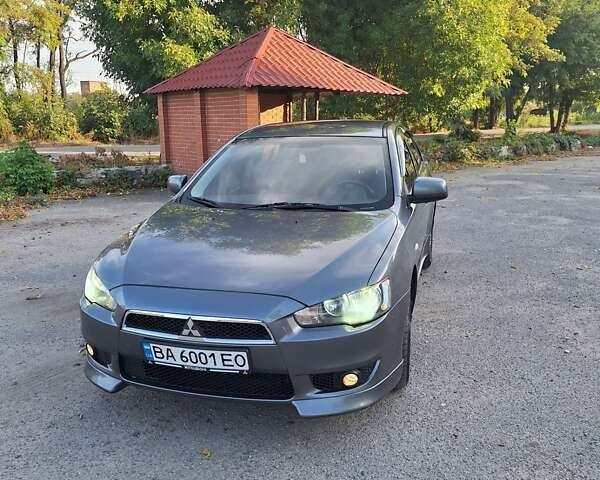 Серый Мицубиси Лансер, объемом двигателя 1.5 л и пробегом 193 тыс. км за 6100 $, фото 1 на Automoto.ua