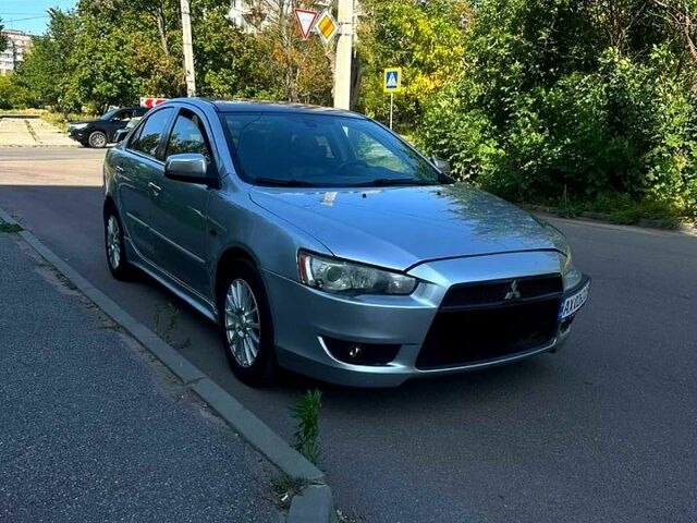 Серый Мицубиси Лансер, объемом двигателя 2 л и пробегом 240 тыс. км за 6500 $, фото 1 на Automoto.ua