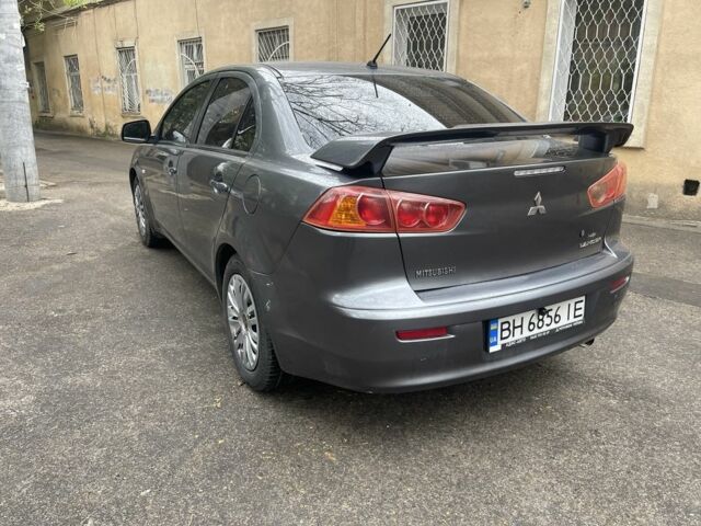 Серый Мицубиси Лансер, объемом двигателя 1.5 л и пробегом 195 тыс. км за 6100 $, фото 1 на Automoto.ua