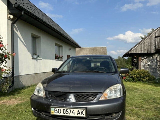 Сірий Міцубісі Lancer, об'ємом двигуна 1.58 л та пробігом 230 тис. км за 4200 $, фото 1 на Automoto.ua