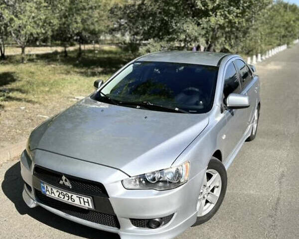 Сірий Міцубісі Lancer, об'ємом двигуна 2 л та пробігом 312 тис. км за 7000 $, фото 1 на Automoto.ua