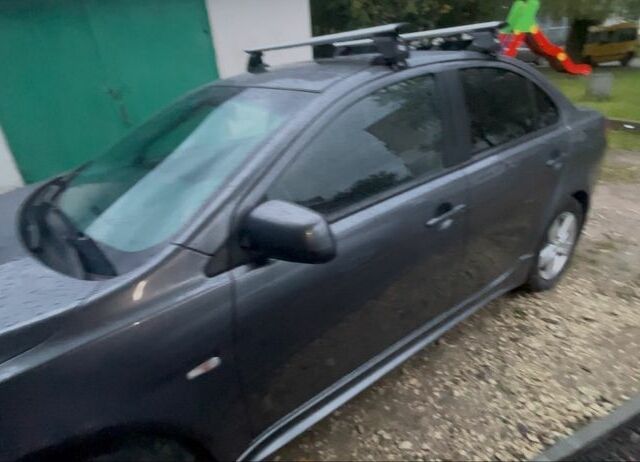 Сірий Міцубісі Lancer, об'ємом двигуна 2 л та пробігом 131 тис. км за 4200 $, фото 1 на Automoto.ua