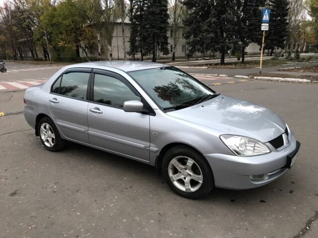 Сірий Міцубісі Lancer, об'ємом двигуна 1.6 л та пробігом 203 тис. км за 0 $, фото 1 на Automoto.ua