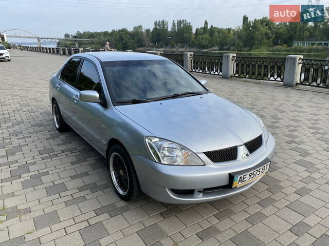 Сірий Міцубісі Lancer, об'ємом двигуна 1.6 л та пробігом 100 тис. км за 7300 $, фото 1 на Automoto.ua