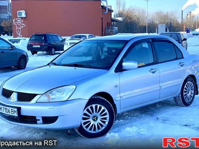 Серый Мицубиси Лансер, объемом двигателя 1.6 л и пробегом 20400 тыс. км за 3899 $, фото 1 на Automoto.ua