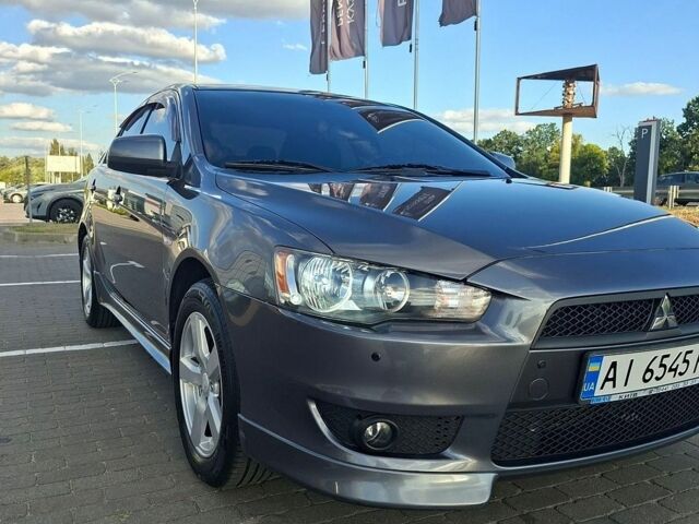 Сірий Міцубісі Lancer, об'ємом двигуна 2 л та пробігом 158 тис. км за 8300 $, фото 1 на Automoto.ua