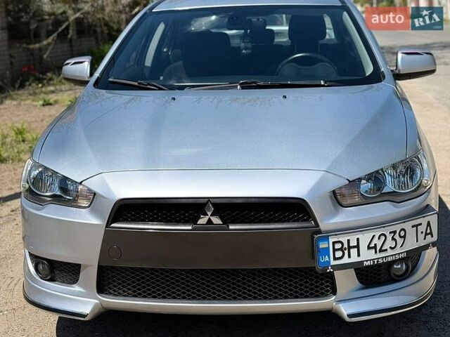 Серый Мицубиси Лансер, объемом двигателя 2 л и пробегом 275 тыс. км за 7600 $, фото 1 на Automoto.ua