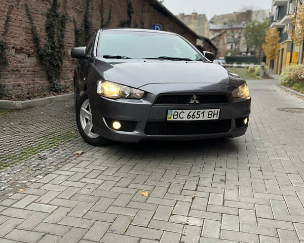 Сірий Міцубісі Lancer, об'ємом двигуна 2 л та пробігом 131 тис. км за 4899 $, фото 1 на Automoto.ua