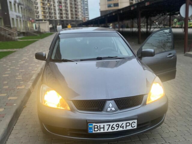 Сірий Міцубісі Lancer, об'ємом двигуна 1.6 л та пробігом 245 тис. км за 3800 $, фото 1 на Automoto.ua